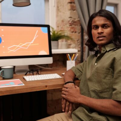 Man Sitting in front of His Computer